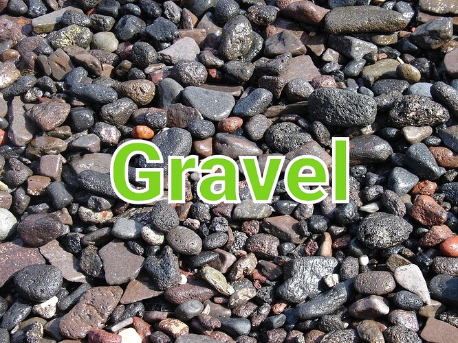 1200px-Gravel_on_a_beach_in_Thirasia,_Santorini,_Greece